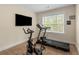 Exercise room with treadmill and exercise bike at 4457 Equity Ct, Ellenwood, GA 30294