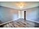 Large bedroom with a ceiling fan, closet, and neutral paint at 5251 Joan Of Arc Pl, Atlanta, GA 30349