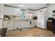 Functional kitchen with white cabinetry and modern appliances, offering a practical and efficient cooking space at 3750 Mckown Rd, Douglasville, GA 30134