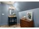 Attic bathroom featuring a sink, updated fixtures, and blue accent wall at 427 Cherokee Se Ave, Atlanta, GA 30312