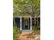 Inviting home exterior with a brick walkway leading to a classic front door with house number displayed above at 427 Cherokee Se Ave, Atlanta, GA 30312