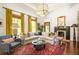 Spacious living room with a fireplace, plush sofa, and decorative accents, perfect for gatherings at 427 Cherokee Se Ave, Atlanta, GA 30312