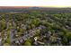 Beautiful aerial view of homes nestled among lush trees in a desirable neighborhood at 422 Laurian Nw Way, Kennesaw, GA 30144