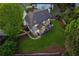 A beautiful landscaped home featuring stone accents, a two-car garage, and a well-maintained lawn at 422 Laurian Nw Way, Kennesaw, GA 30144