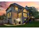 Back exterior with large windows, a spacious deck, and a private backyard, perfect for outdoor living and entertaining at 422 Laurian Nw Way, Kennesaw, GA 30144