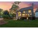 Back exterior with large windows, a spacious deck, and a private backyard, perfect for outdoor living and entertaining at 422 Laurian Nw Way, Kennesaw, GA 30144