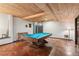 Finished basement featuring a pool table, wood ceiling and ample space for recreation at 422 Laurian Nw Way, Kennesaw, GA 30144