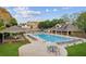 Community pool area with lounge chairs and tables, offering a refreshing outdoor amenity at 422 Laurian Nw Way, Kennesaw, GA 30144