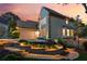 A beautiful landscaped home featuring stone accents, a two-car garage, and a well-maintained lawn at 422 Laurian Nw Way, Kennesaw, GA 30144