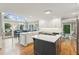 Bright kitchen with white cabinets, stainless appliances, and a large island at 422 Laurian Nw Way, Kennesaw, GA 30144