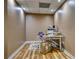 Small office with wood floors, desk, chair, and a printer setup at 7746 Tyree Rd, Winston, GA 30187
