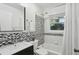 Bathroom with a single sink and tub with shower at 2419 Little John Se Trl, Marietta, GA 30067