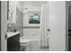 Bathroom with white and decorative tile surround at 2419 Little John Se Trl, Marietta, GA 30067