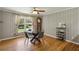 Cozy dining room with a modern glass table, stylish chairs, and a charming wine rack for entertaining at 2419 Little John Se Trl, Marietta, GA 30067