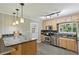Modern kitchen boasting granite countertops, stainless steel appliances, and a stylish breakfast bar for casual dining at 2419 Little John Se Trl, Marietta, GA 30067
