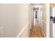 Long hallway leading to the bedrooms and bathrooms in this home at 30 Dogwood Trl, Dallas, GA 30157