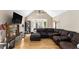 Spacious living room features vaulted ceilings, stone fireplace, and large windows for ample natural light at 30 Dogwood Trl, Dallas, GA 30157