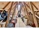 Spacious attic with visible rafters, ideal for storage or potential expansion at 3230 Riverhill Ct, Cumming, GA 30041