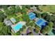 Aerial view of pool, tennis courts, baseball field and clubhouse, highlighting this neighborhood's amenities at 3230 Riverhill Ct, Cumming, GA 30041