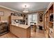 Inviting home office with custom cabinetry, large desk, and plenty of natural light at 3230 Riverhill Ct, Cumming, GA 30041