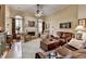 Inviting living room with fireplace and ample natural light, creating a cozy and warm atmosphere at 3230 Riverhill Ct, Cumming, GA 30041