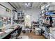 Bright studio space filled with crafting supplies and natural light from the window at 3230 Riverhill Ct, Cumming, GA 30041