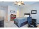Cozy bedroom with desk, ceiling fan, neutral color scheme and a ceiling fan at 4495 Alister Park Dr, Cumming, GA 30040