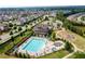 Aerial view of a community pool, clubhouse, playground, and walking paths at 4495 Alister Park Dr, Cumming, GA 30040