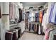 Large walk-in closet with custom shelving and ample storage space at 4495 Alister Park Dr, Cumming, GA 30040