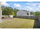 Fenced in backyard with small patio, and a small shed in the back corner at 543 Walnut Way, Palmetto, GA 30268