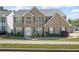 Charming two-story brick home with manicured landscaping and a welcoming front entrance at 543 Walnut Way, Palmetto, GA 30268