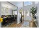 Open foyer with views into the dining room, showcasing the home's natural light and modern design at 543 Walnut Way, Palmetto, GA 30268
