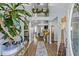Inviting foyer featuring hardwood floors, a staircase, and elegant decor at 543 Walnut Way, Palmetto, GA 30268