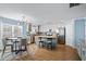 Bright eat-in kitchen with stainless steel appliances, granite countertops, and modern cabinetry at 543 Walnut Way, Palmetto, GA 30268