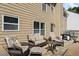 Inviting patio area with outdoor seating, perfect for relaxing and entertaining with grill at 543 Walnut Way, Palmetto, GA 30268