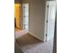 Hallway with carpeted floor with doors to other rooms at 6426 Rosetta Drive # 53, South Fulton, GA 30331