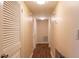 Well-lit hallway featuring wood-look flooring and fresh paint at 177 Nw Amherst Pl, Atlanta, GA 30327
