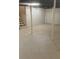 Spacious unfinished basement with concrete floor and support beams at 2598 Miriam Ln, Decatur, GA 30032