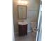 Bathroom with vanity, toilet, tile flooring, mirror and lighting at 2598 Miriam Ln, Decatur, GA 30032