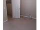 Bedroom with a door to closet with gray walls and light color flooring at 2598 Miriam Ln, Decatur, GA 30032