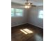 Sunny bedroom with hardwood floors and ample natural light at 2598 Miriam Ln, Decatur, GA 30032