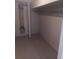 A basic closet in needs of storage shelves at 2598 Miriam Ln, Decatur, GA 30032
