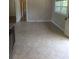 Open-concept living room with tiled floors and natural light at 2598 Miriam Ln, Decatur, GA 30032