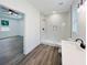 Modern bathroom with glass-enclosed shower, quartz counters, and stylish fixtures at 5215 Virginia Ave, Cumming, GA 30041