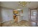 Open kitchen with eat-at counter and stainless steel appliances at 5587 Strathmoor Manor Cir, Lithonia, GA 30058