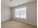 Bedroom featuring neutral walls, carpeting, and a window with blinds at 1080 Abington Ct, Douglasville, GA 30134