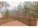 Enjoy the scenery from this outdoor wooden deck at 1080 Abington Ct, Douglasville, GA 30134