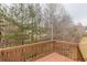 Enjoy the scenery from this outdoor wooden deck at 1080 Abington Ct, Douglasville, GA 30134