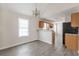 Open-concept living space with modern gray flooring at 1080 Abington Ct, Douglasville, GA 30134
