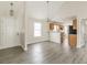 Open-concept living space with modern gray flooring at 1080 Abington Ct, Douglasville, GA 30134